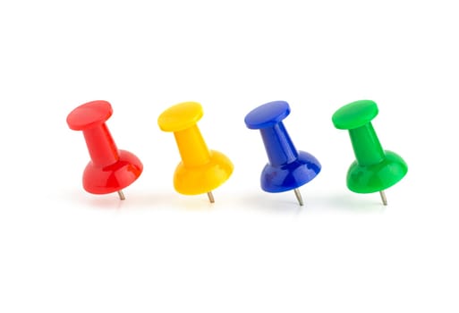 Four colorful pins