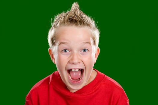 happy boy in front of green background