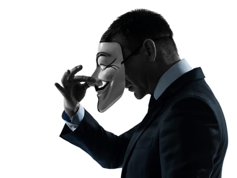 PARIS– OCTOBER 30 : one man dressed and masked as a  member of Anonymous underground group on October 30, 2012 in Paris ,France