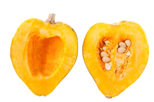Two halves of an acorn squash,one with seeds one without.