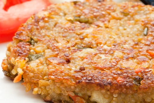 Closeup of  a vegetarian quinoa burger.