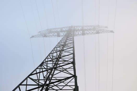 Power pole in the fog