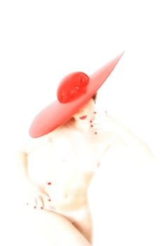 Female nude hi key with big red hat in frontal view