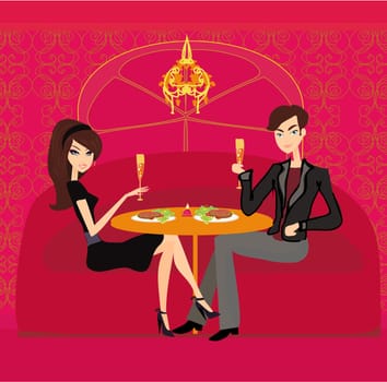 Young couple flirt and drink champagne