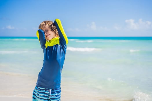 A carefree boy explores the wonders of the beach, with the sun-kissed shoreline as his playground, embodying the spirit of childhood adventure.