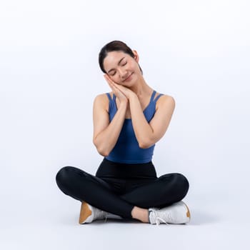 Full body asian woman in sportswear portrait, smiling and posing cheerful gesture. Workout training with attractive girl engage in her pursuit of healthy lifestyle. Isolated background Vigorous