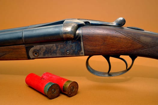 shotgun and its cartridges. Still life representing hunting.