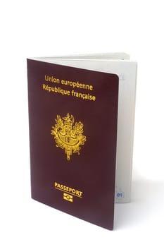 biometric French passport in studio on white zone