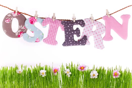 Easter letters over spring meadow