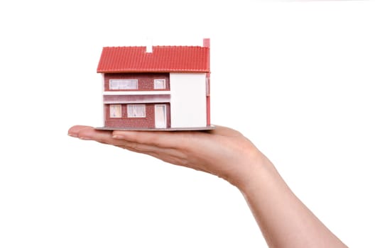 House on one hand in front of isolated white background