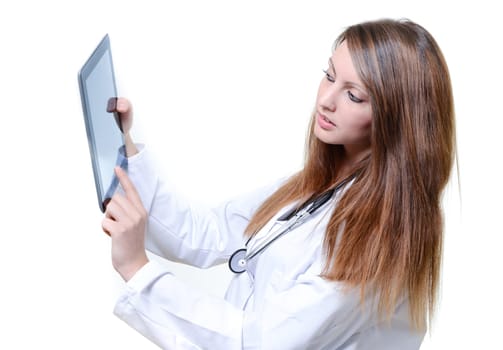 Pretty female student doctor working with an digital tablet