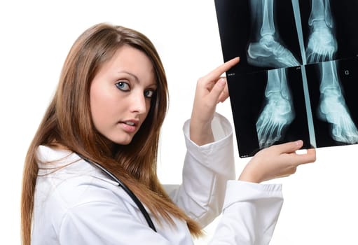 female doctor with x-ray in hand over a white background