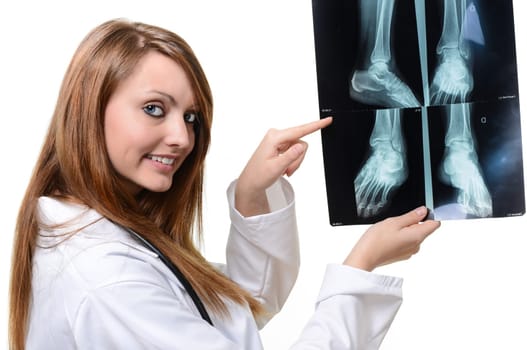 female doctor with x-ray in hand over a white background