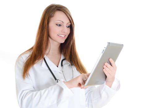 Pretty female student doctor working with an digital tablet