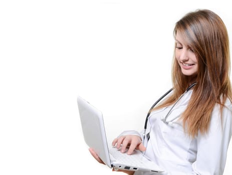 Pretty female student doctor working with notebook