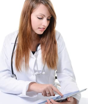 Pretty female student doctor working with an digital tablet