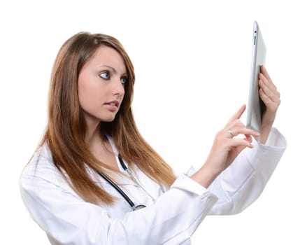 Pretty female student doctor working with an digital tablet