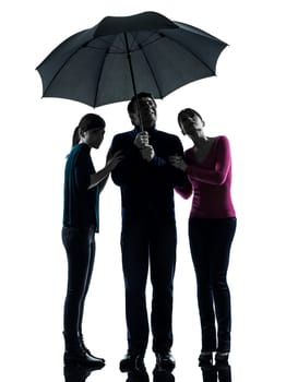 one caucasian family father mother daughter man under umbrella  danger afraid  in silhouette studio isolated on white background