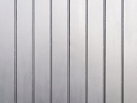 A silver painted wooden wall