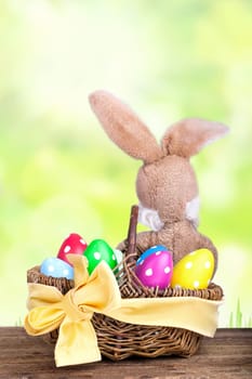 Easter eggs in basket with Easter bunny