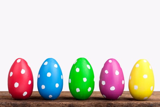 Colorful Easter eggs against white background