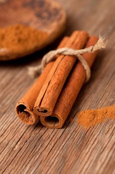 Cinnamon on old wooden surface