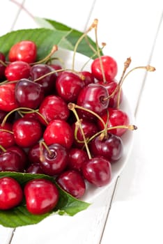 Sweet cherries on the wooden table