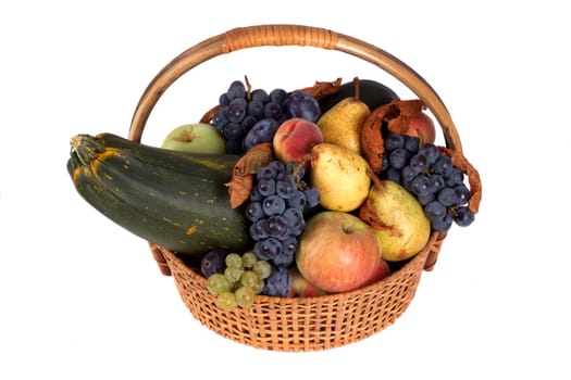 Autumn basket with fruits and vegetables