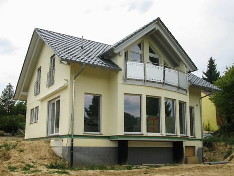Detached house with glass front