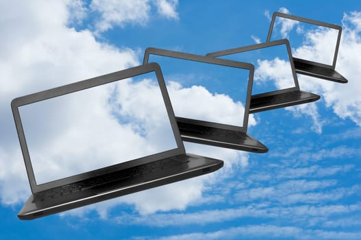 Cloud Computing - Flying Notebooks on Summer blue sky with clouds