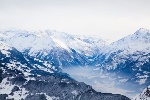 Landscape of the mountains covered with snow. Snowy Mountain.
