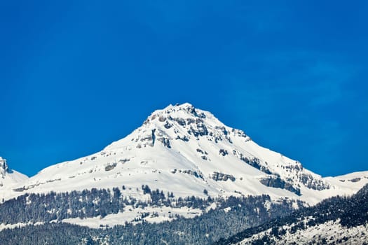 Landscape of the mountains covered with snow. Snowy Mountain.