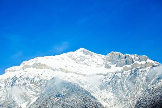 Landscape of the mountains covered with snow. Snowy Mountain.