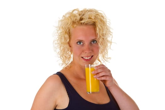 Young woman with a glass of orange juice isolated on white background