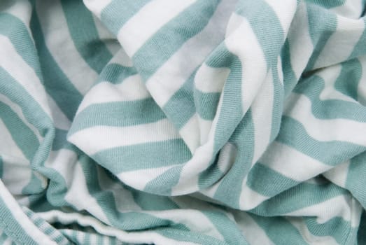 cotton background with white and green stripes