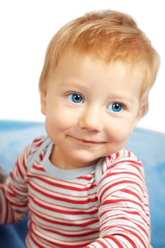 Studio portrait of a happy one year old baby boy.