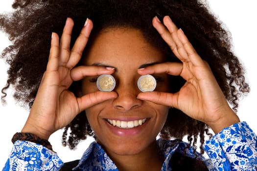Attractive African American woman holding two Ruro coins in front of her eyes - isolated on white background