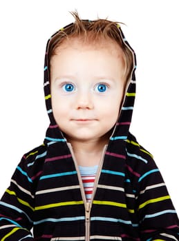 Studio portrait of a happy one year old baby boy isolated on white.