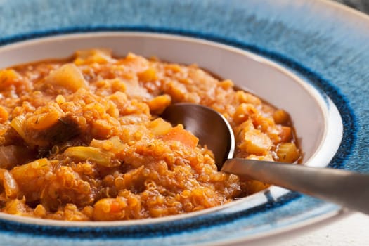 Fresh homemade quinoa stew with fresh vegetables.