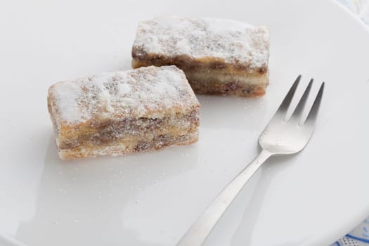 Two small pieces of sweet cake