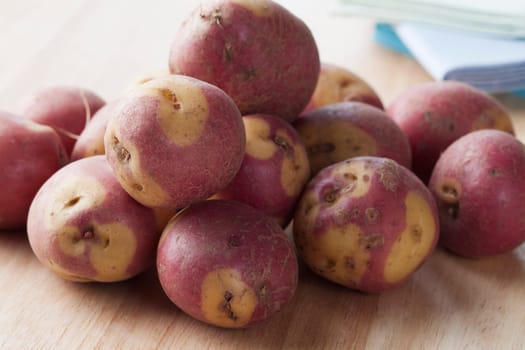 Apache potatoes raw on cutting board