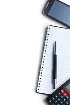 Office concept. Calculator, pen, notebook and cellphone.