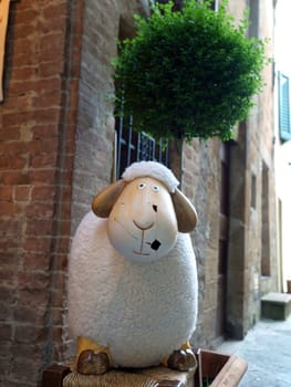 ovely mascots of sheep Pienza. Pienza is famous for its cheese