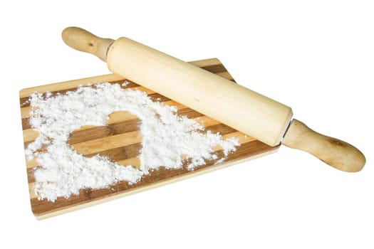 Dough roller, board and flour with heart shape. Isolated on white background.