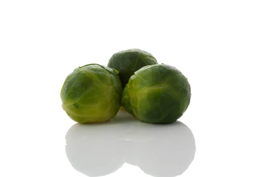 Three fresh brussels sprout