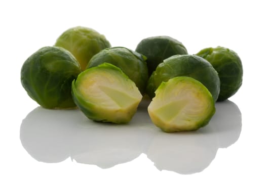 Fresh brussels sprout against white