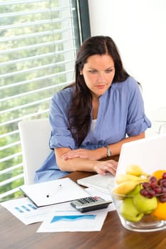 Young woman working using laptop studying office internet business