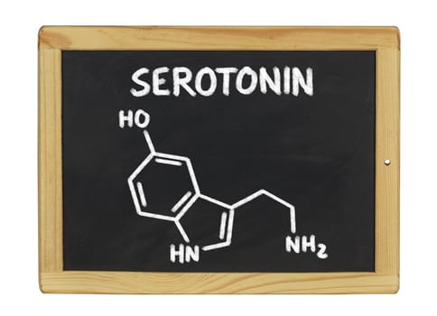 chemical structural formula of serotonin on a slate