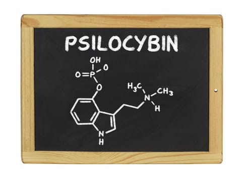 chemical structural formula of psilocybin on a slate