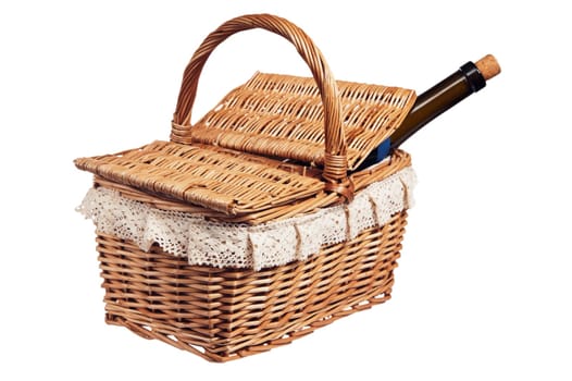 Picnic basket with a bottle of wine, isolated on white